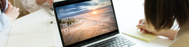 Woman Using Macbook Air During The Meeting Marque Hdf Tourisme